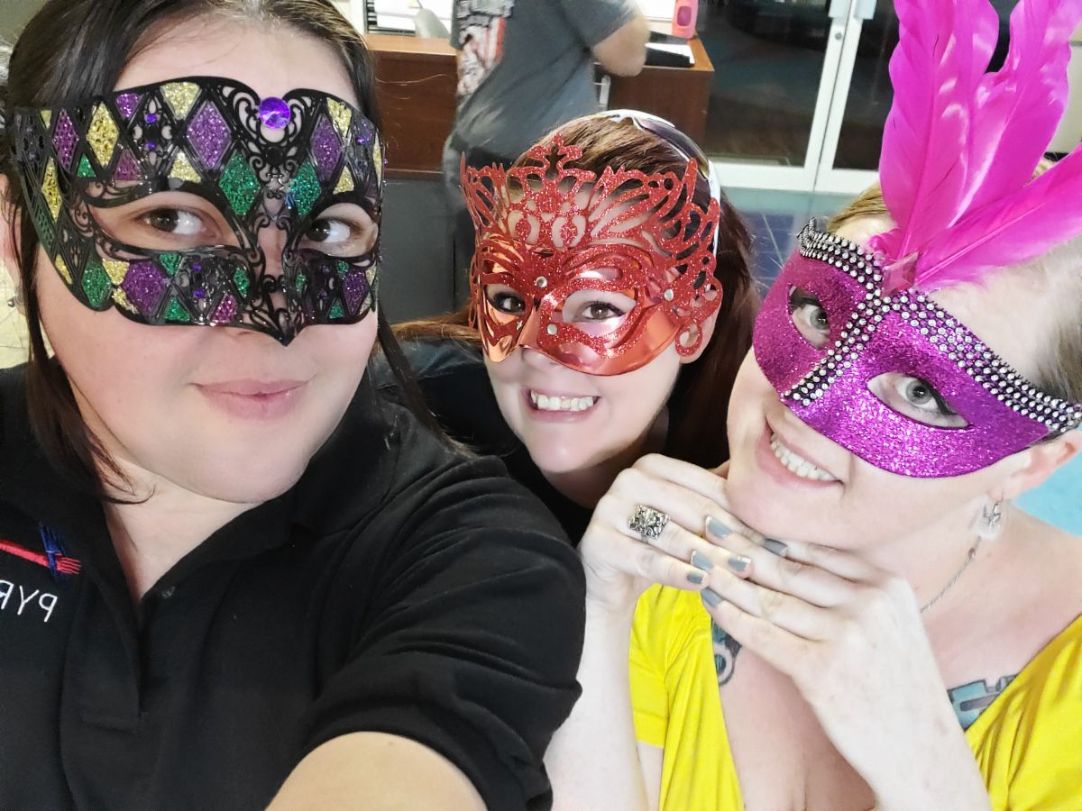 Three women in masks