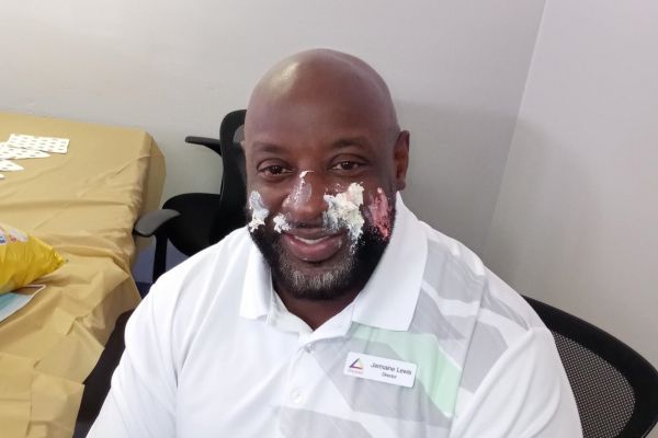 man with cake on face