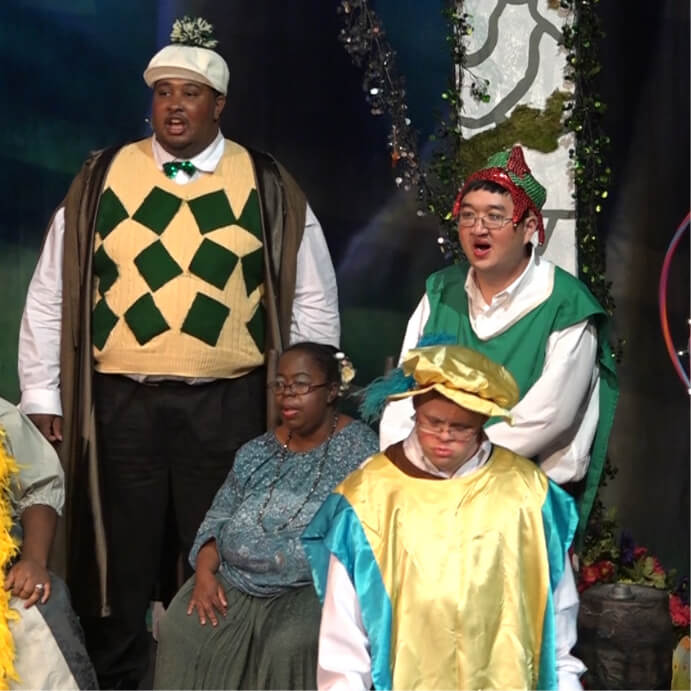 four characters from Spellbound on stage